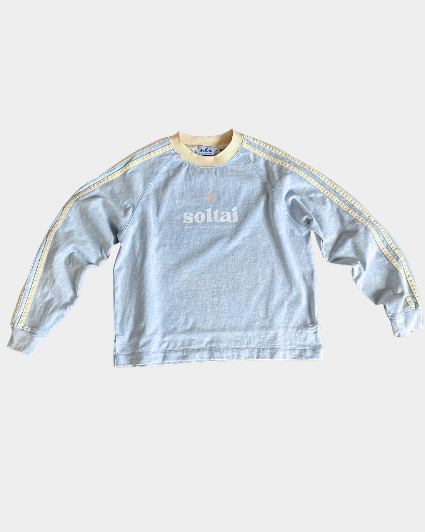Light blue sweatshirt with 'soltai' logo on a white background